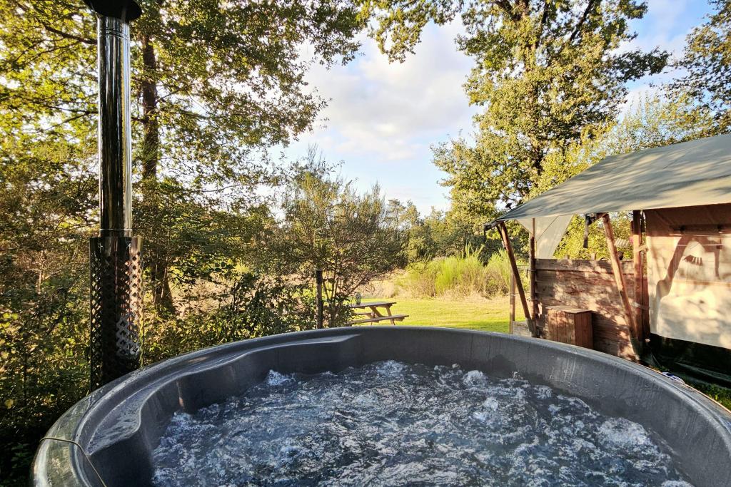 Camping Le Ranch - Tentes safari avec bain nordique