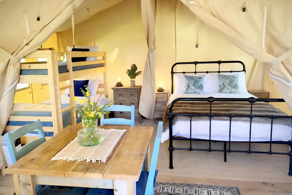 Camping Le Ranch - Tentes safari avec bain nordique